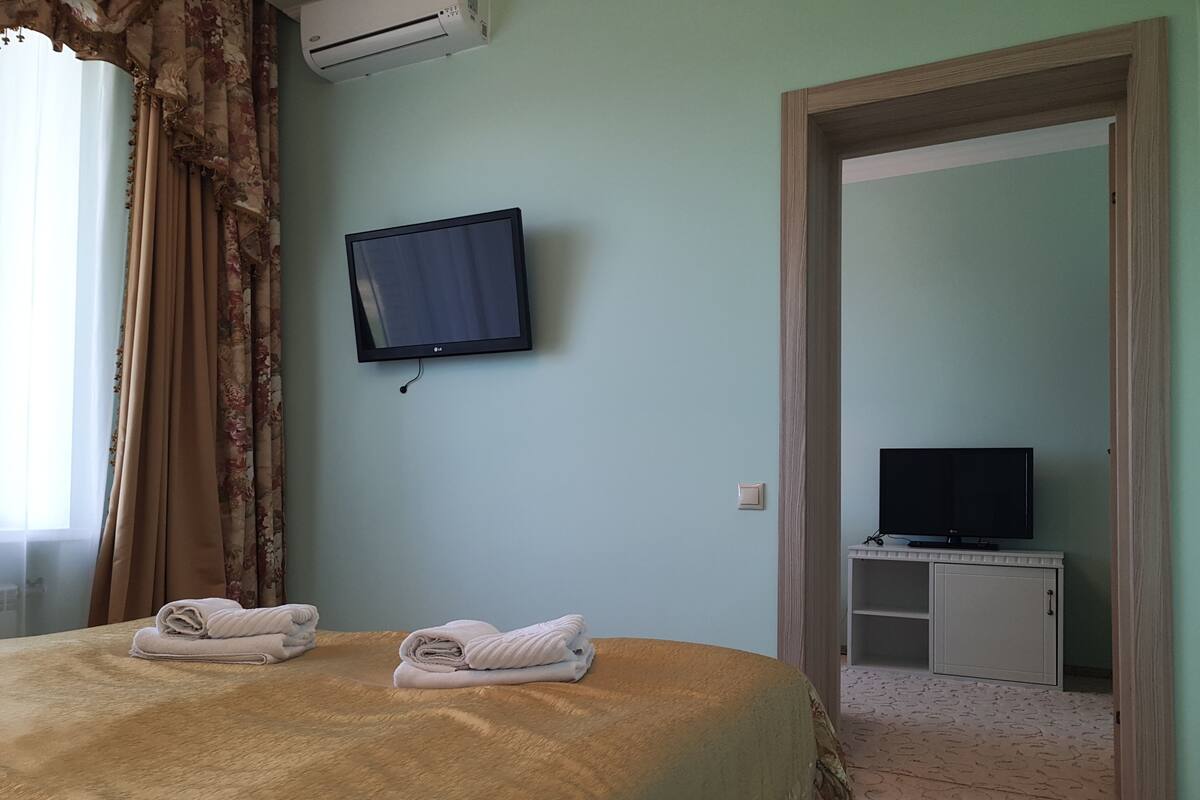 Premier Suite, 1 Bedroom, Pool Access | Iron/ironing board (on request), rollaway beds, free WiFi