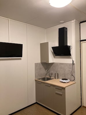 Economy Studio | Private kitchen | Microwave, cleaning supplies, paper towels