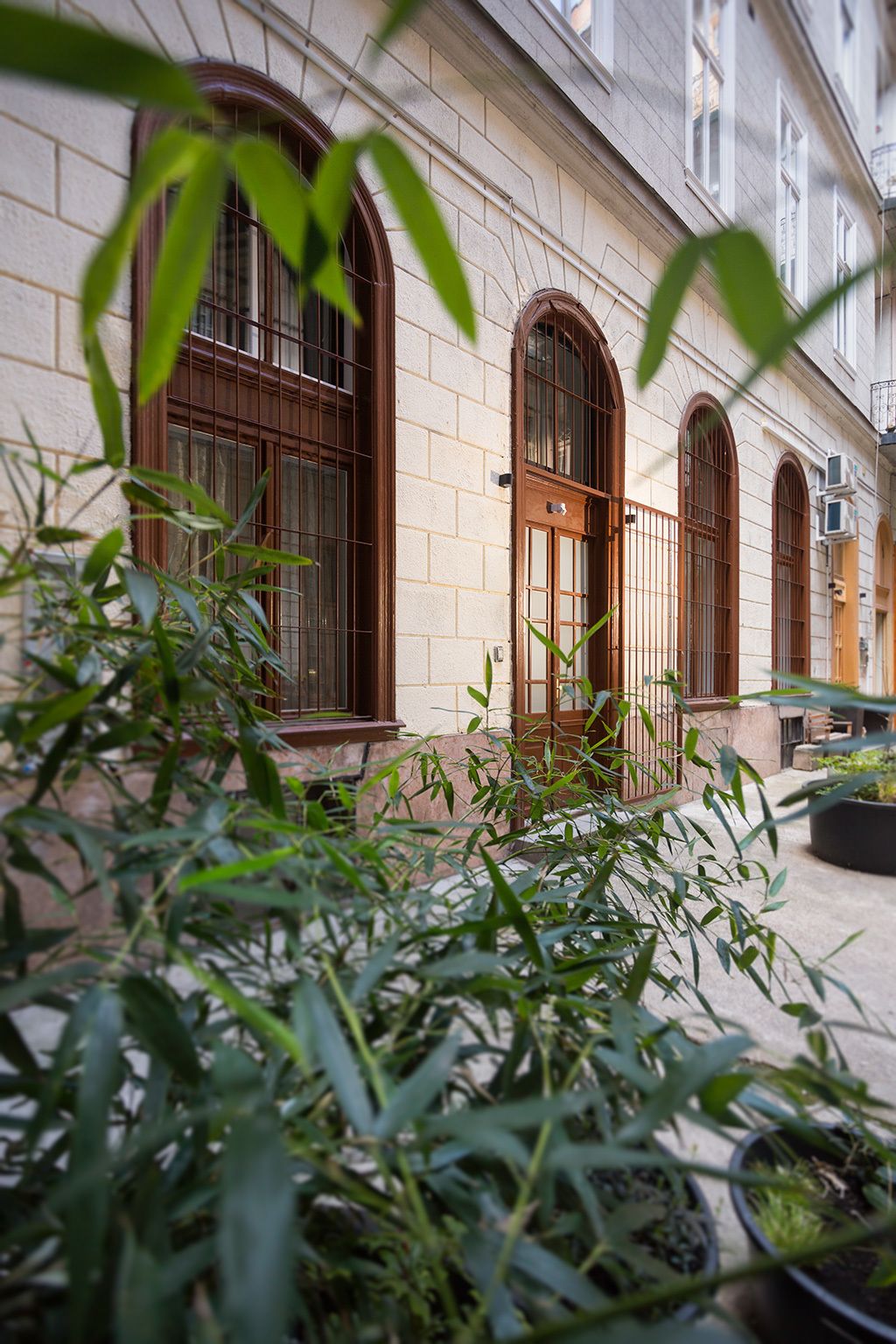 A building with arched windows and a brick facade.