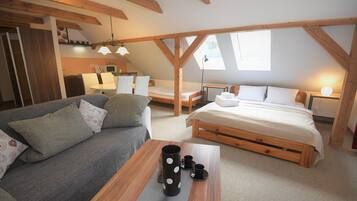 Premium Quadruple Room | Select Comfort beds, desk, blackout drapes, soundproofing