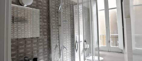 Deluxe Double Room (Celeste) | Bathroom | Shower, hair dryer, bidet, towels