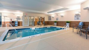 An indoor swimming pool with a shallow water warning sign, a maximum weight limit sign, and a no diving sign. - Fairfield Inn & Suites by Marriott Indianapolis Fishers (Indianapolis)