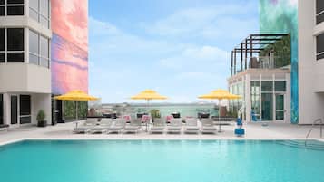 Outdoor pool, open 8:00 AM to 10:00 PM, pool umbrellas, pool loungers