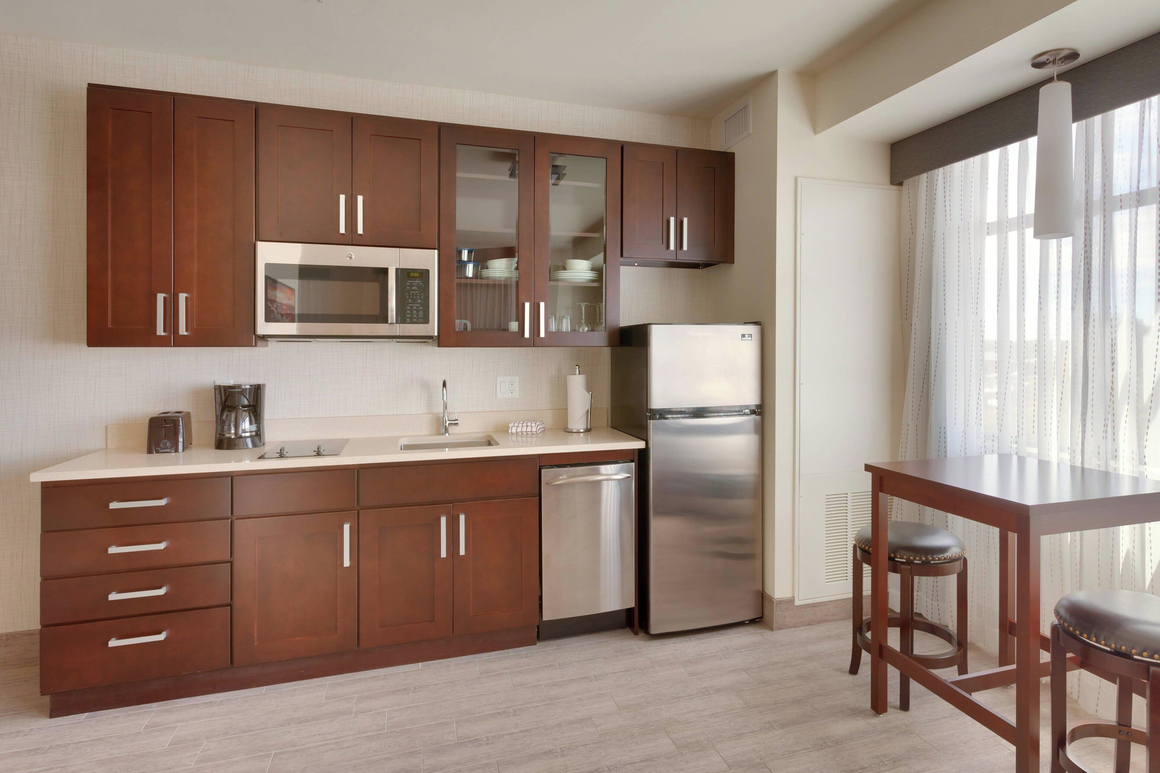 executive studio, 1 king bed | private kitchen | full-sized fridge, microwave, stovetop, dishwasher