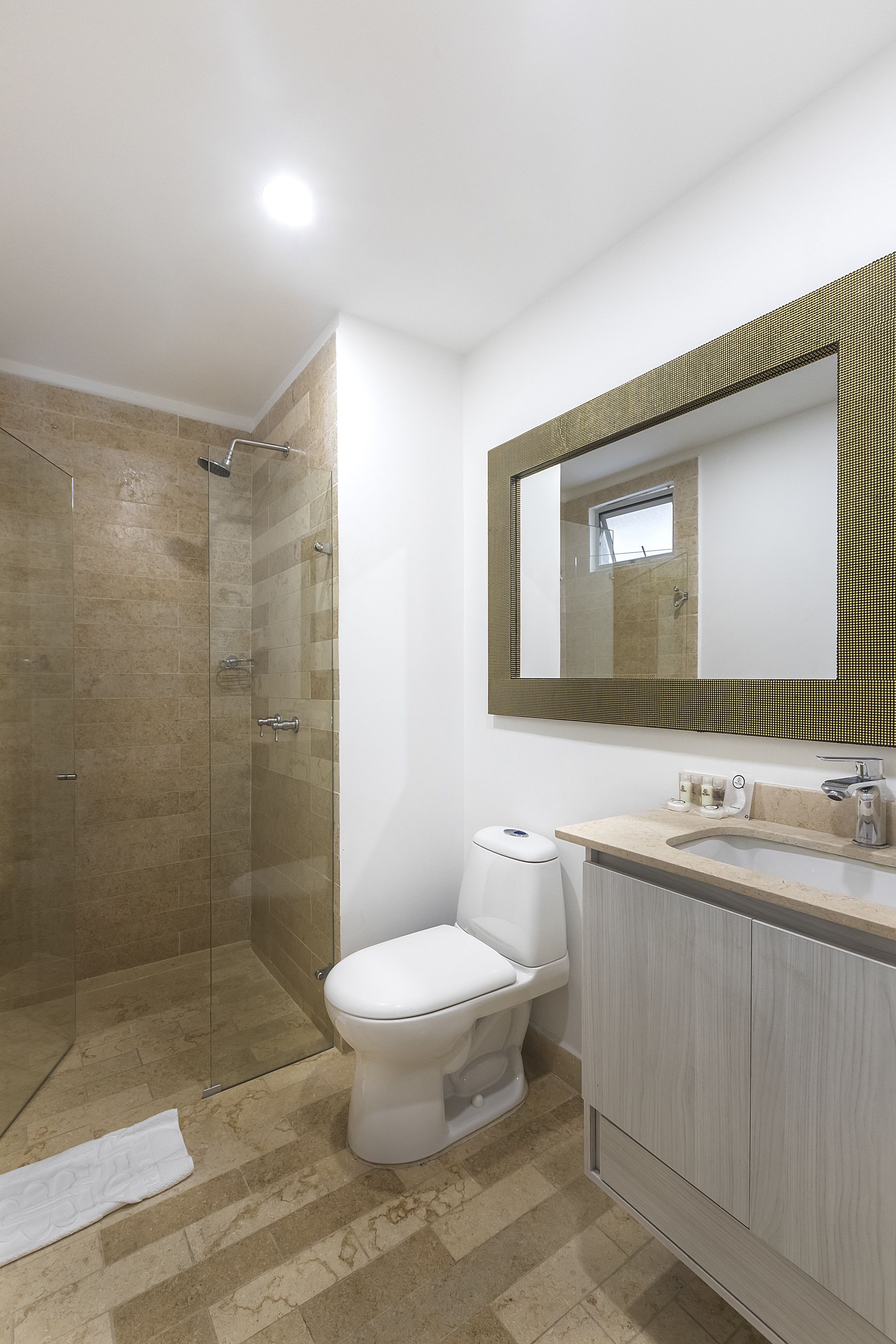 jetted bath, rainfall showerhead, free toiletries, hair dryer