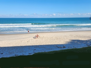 On the beach, sun-loungers, beach umbrellas, beach towels