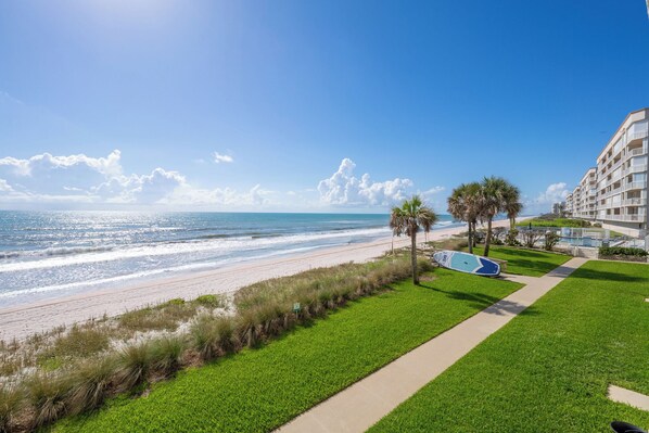 On the beach, sun loungers, beach umbrellas, beach towels