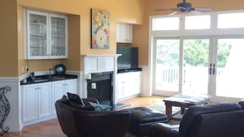 Smart TV, fireplace, DVD player, books