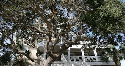 Beautiful wraparound porches & easy walk to the beach