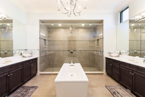 Bathtub, hair dryer, towels