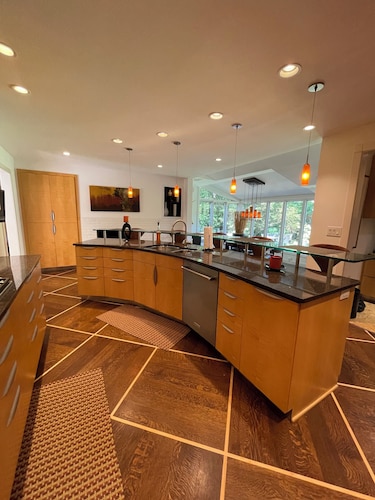 Mid-century modern ranch on Sedgefield Country Club golf course