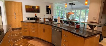 Mid-century modern ranch on Sedgefield Country Club golf course