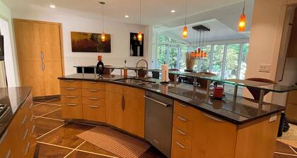 Mid-century modern ranch on Sedgefield Country Club golf course