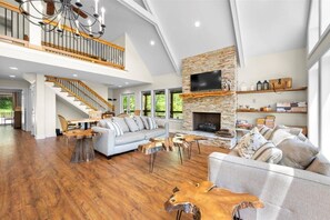 Smart TV, fireplace, books