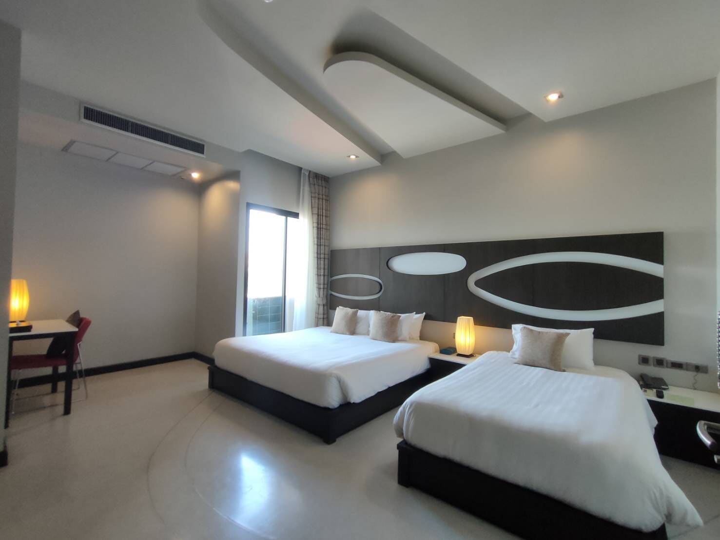 family triple room | premium bedding, blackout curtains, iron/ironing board, rollaway beds