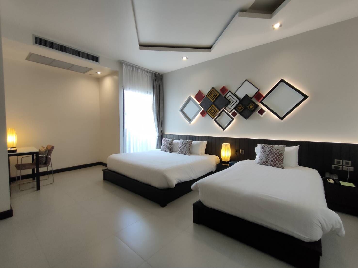 family triple room | premium bedding, blackout curtains, iron/ironing board, rollaway beds