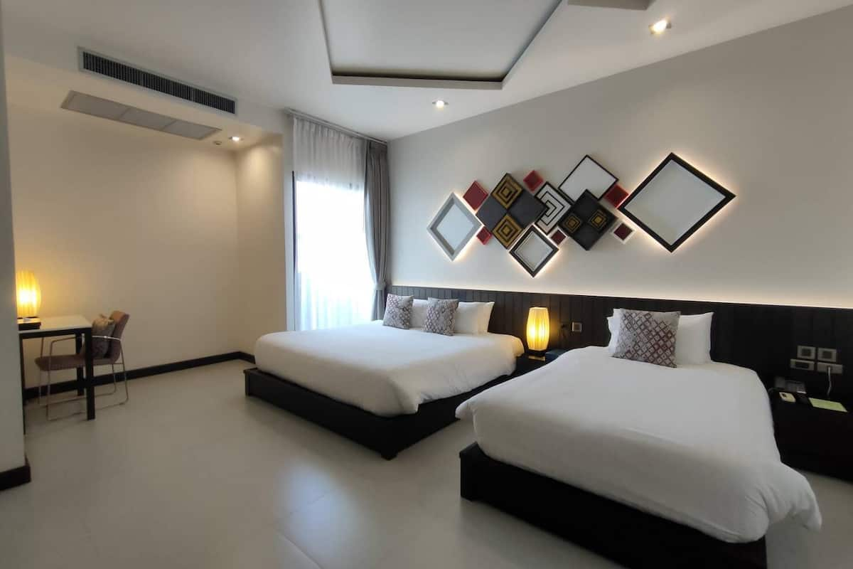 Family Triple Room | Free minibar, blackout drapes, rollaway beds, free WiFi