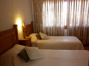 Soundproofing, iron/ironing board, free cribs/infant beds, rollaway beds