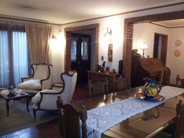 Flat-screen TV, DVD player, iPod dock, pay movies