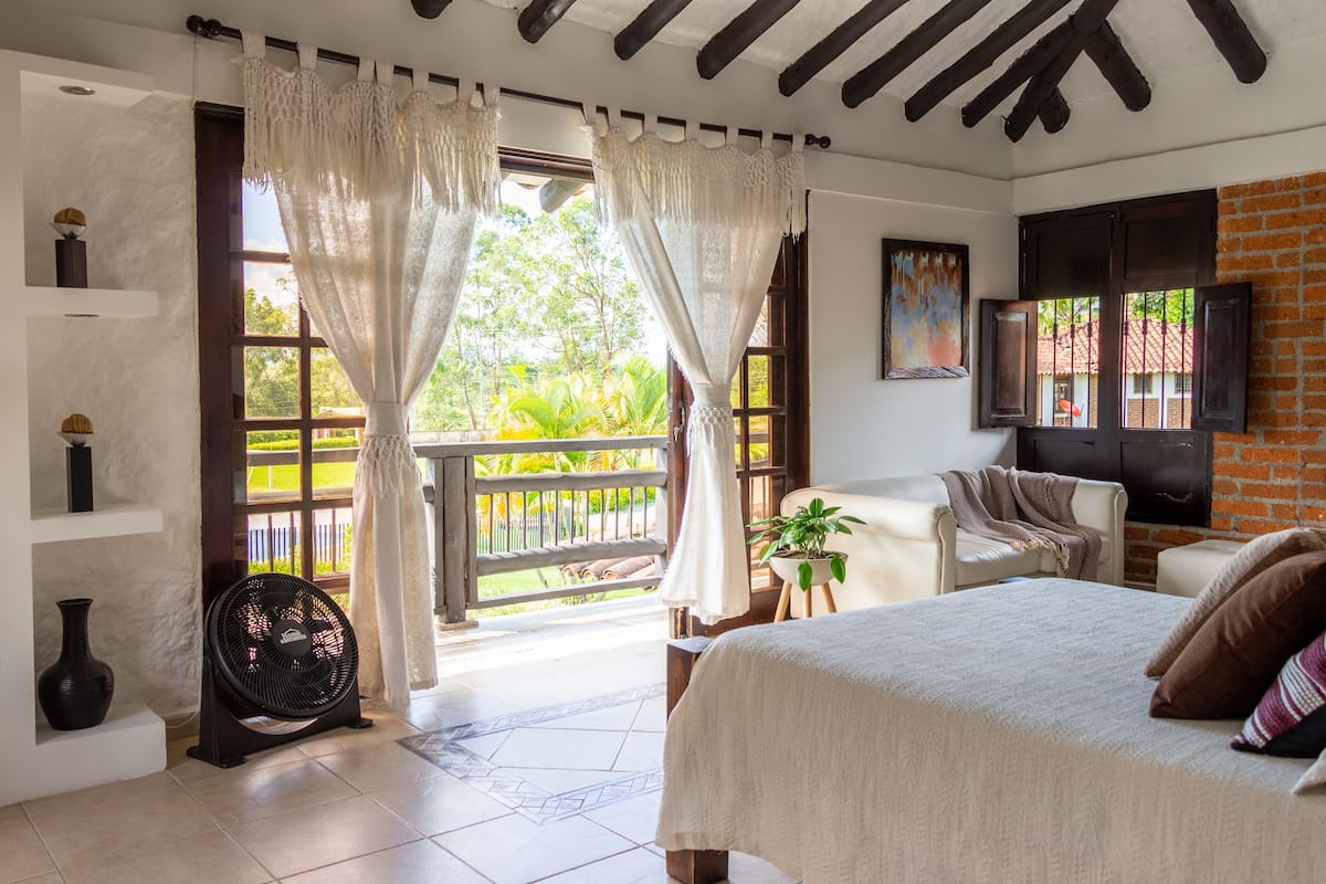 traditional suite, refrigerator, pool view | view from room