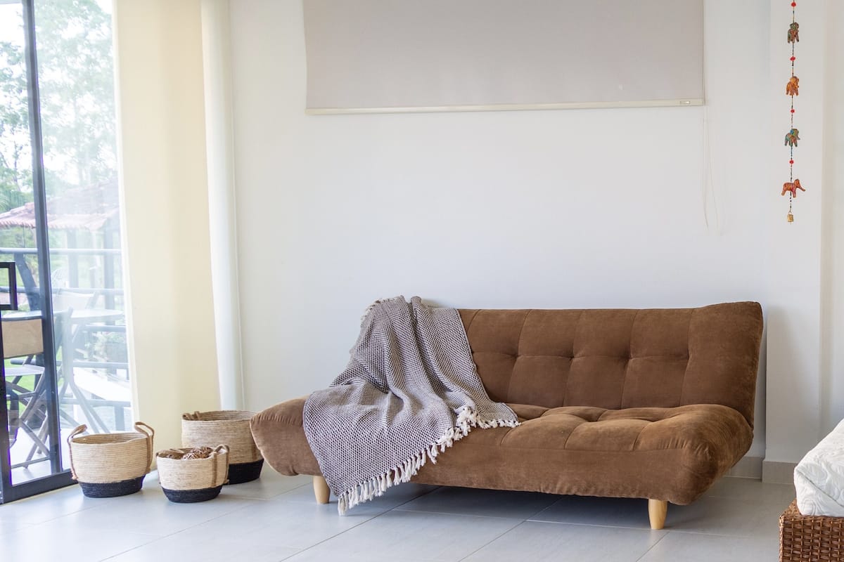 exclusive apartment, refrigerator & microwave, pool view | living area | flat-screen tv