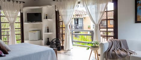 Traditional Suite, Refrigerator, Pool View | 1 bedroom, free WiFi, bed sheets