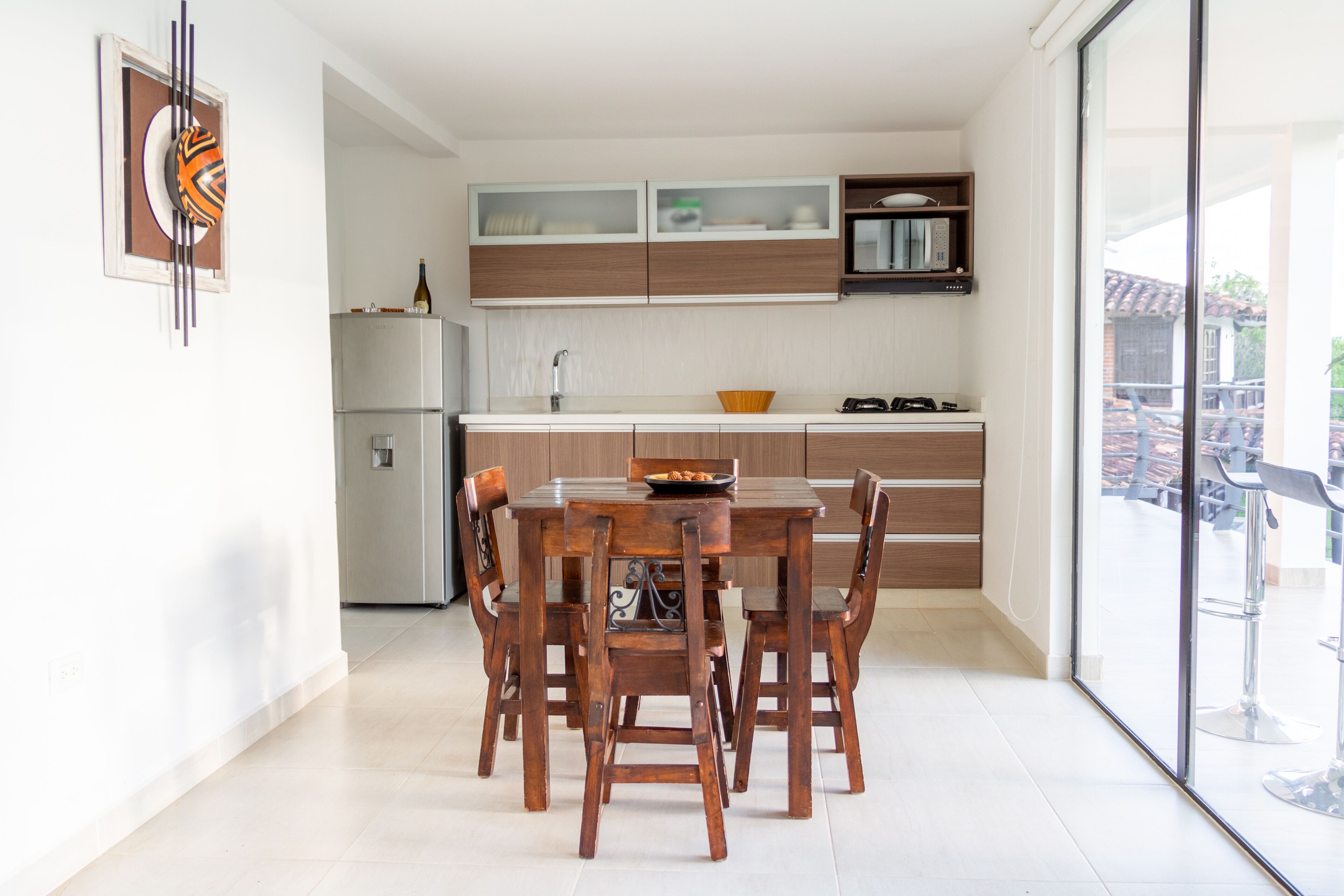 exclusive apartment, refrigerator & microwave, pool view | private kitchen