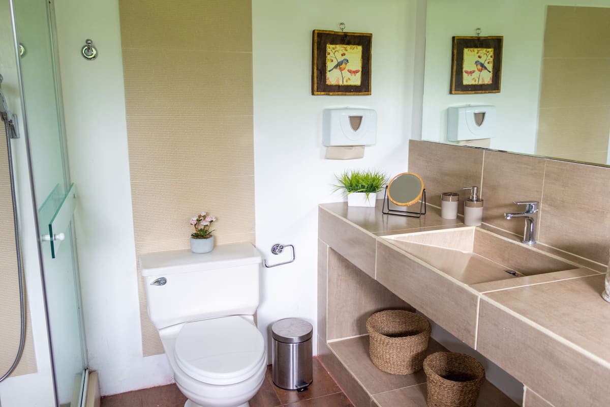 traditional suite, refrigerator, pool view | bathroom | free toiletries, towels