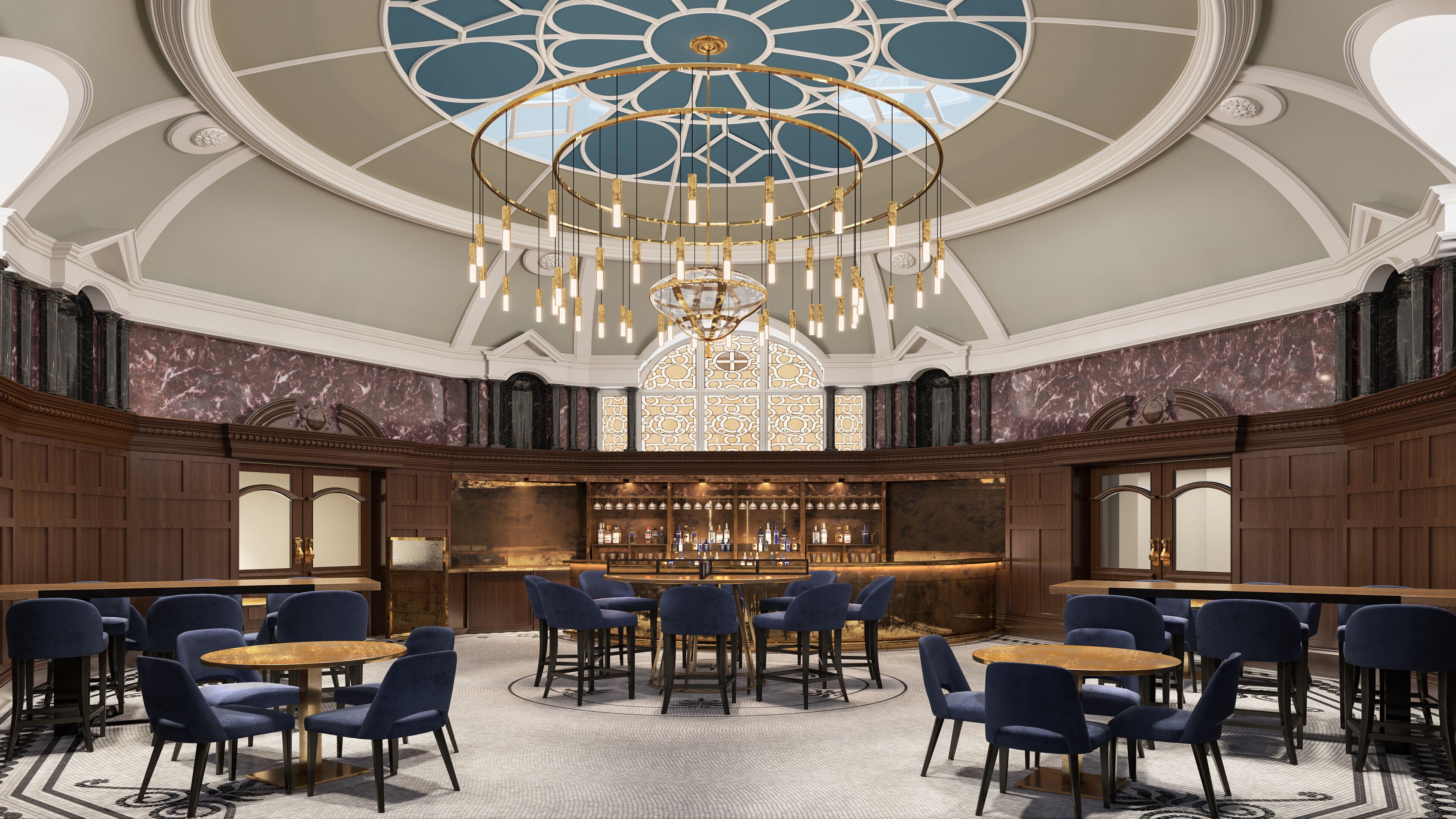 A bar area with a high ceiling, chandeliers, and marble walls.
