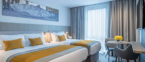 In-room safe, laptop workspace, blackout drapes, soundproofing