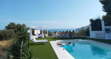 Villa surrounded by greenery with sea view and swimming pool