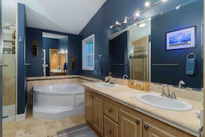 Bathtub, hair dryer, towels, soap