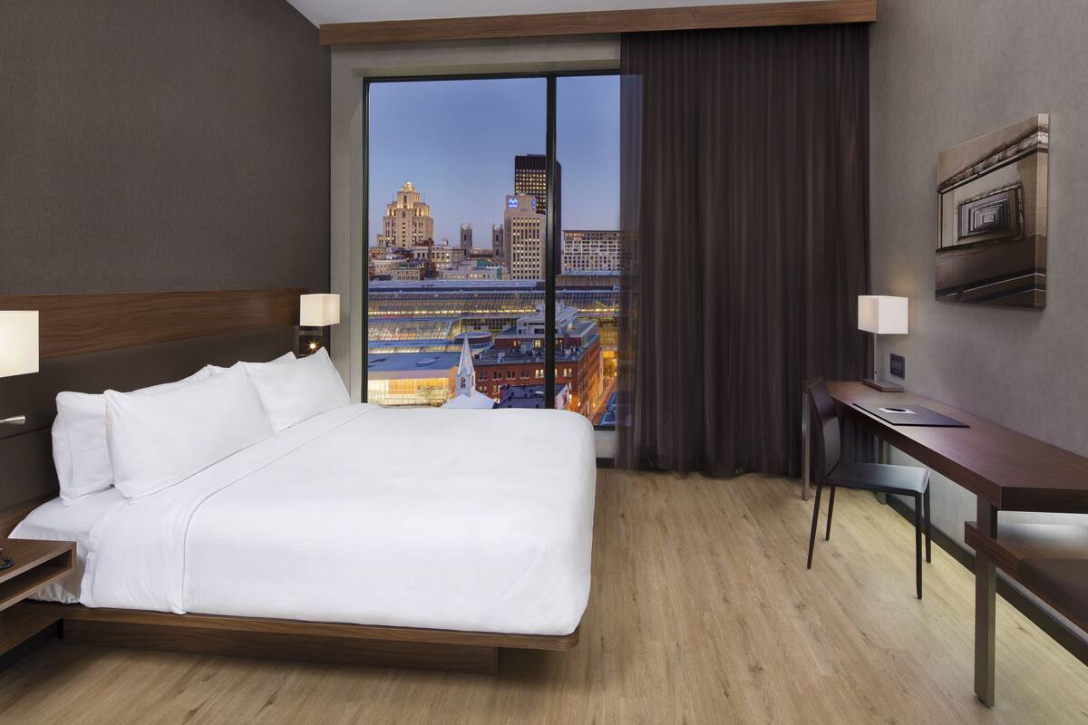 room, 1 king bed | in-room safe, desk, iron/ironing board, free cots/infant beds