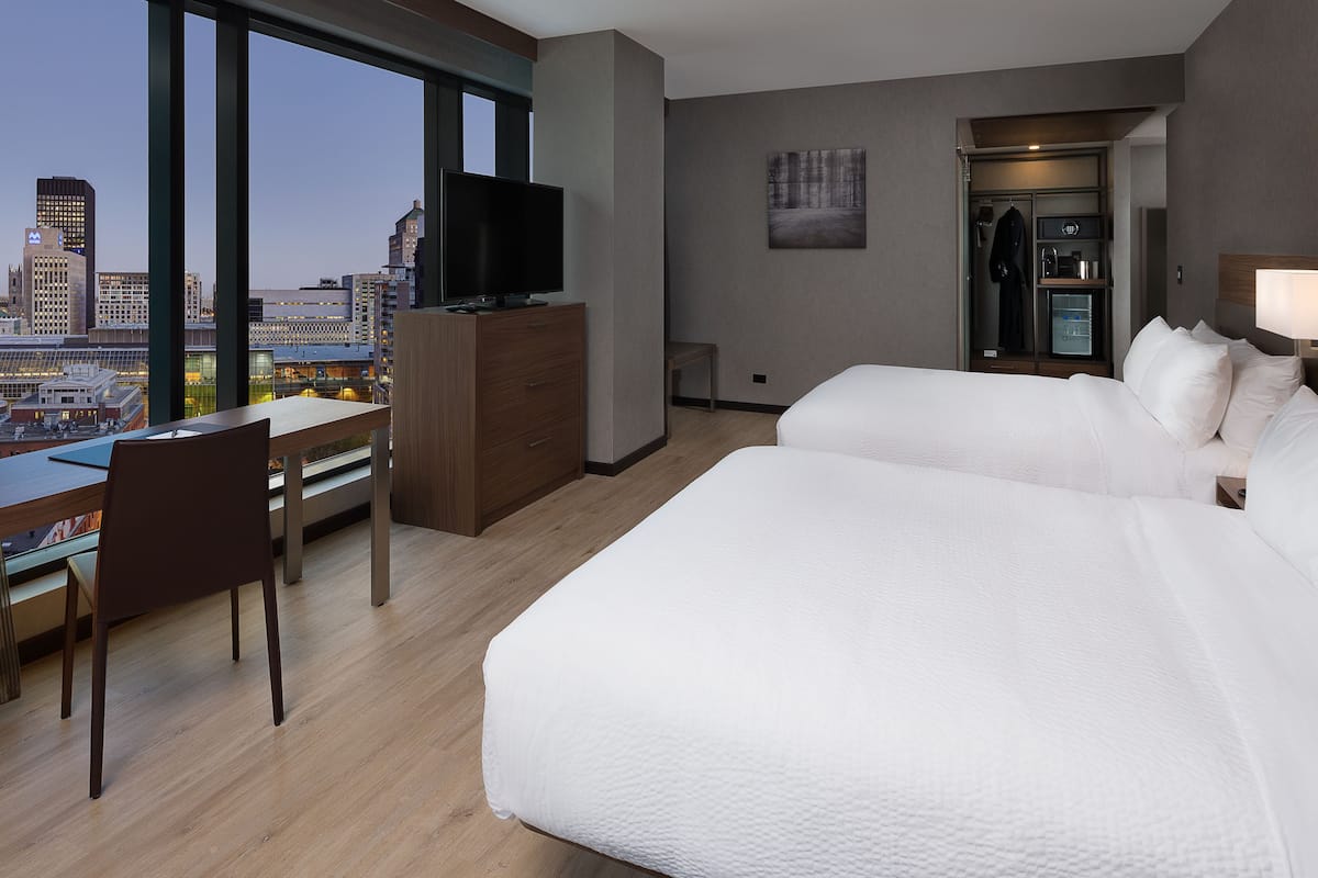 room, 2 queen beds | in-room safe, desk, iron/ironing board, free cots/infant beds