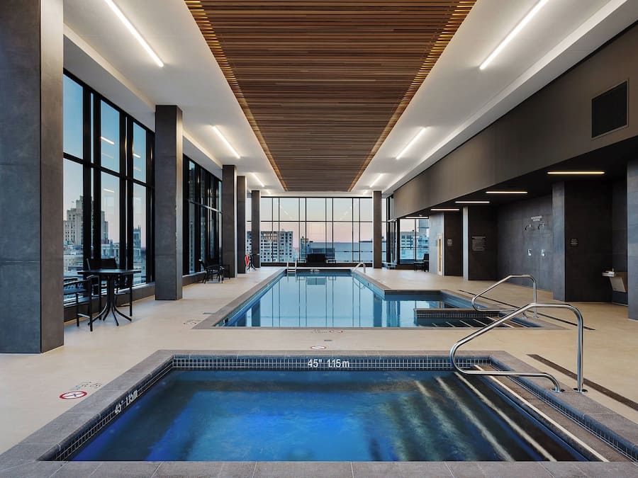 Indoor pool, open 7:00 AM to 11:00 PM, pool loungers