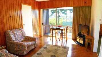 1 Bedroom Apartment | Blackout drapes, iron/ironing board, individually furnished, bed sheets