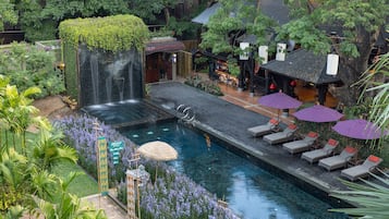 Outdoor pool, open 6:00 AM to 8:00 PM, pool umbrellas, pool loungers