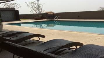 Outdoor pool, pool loungers