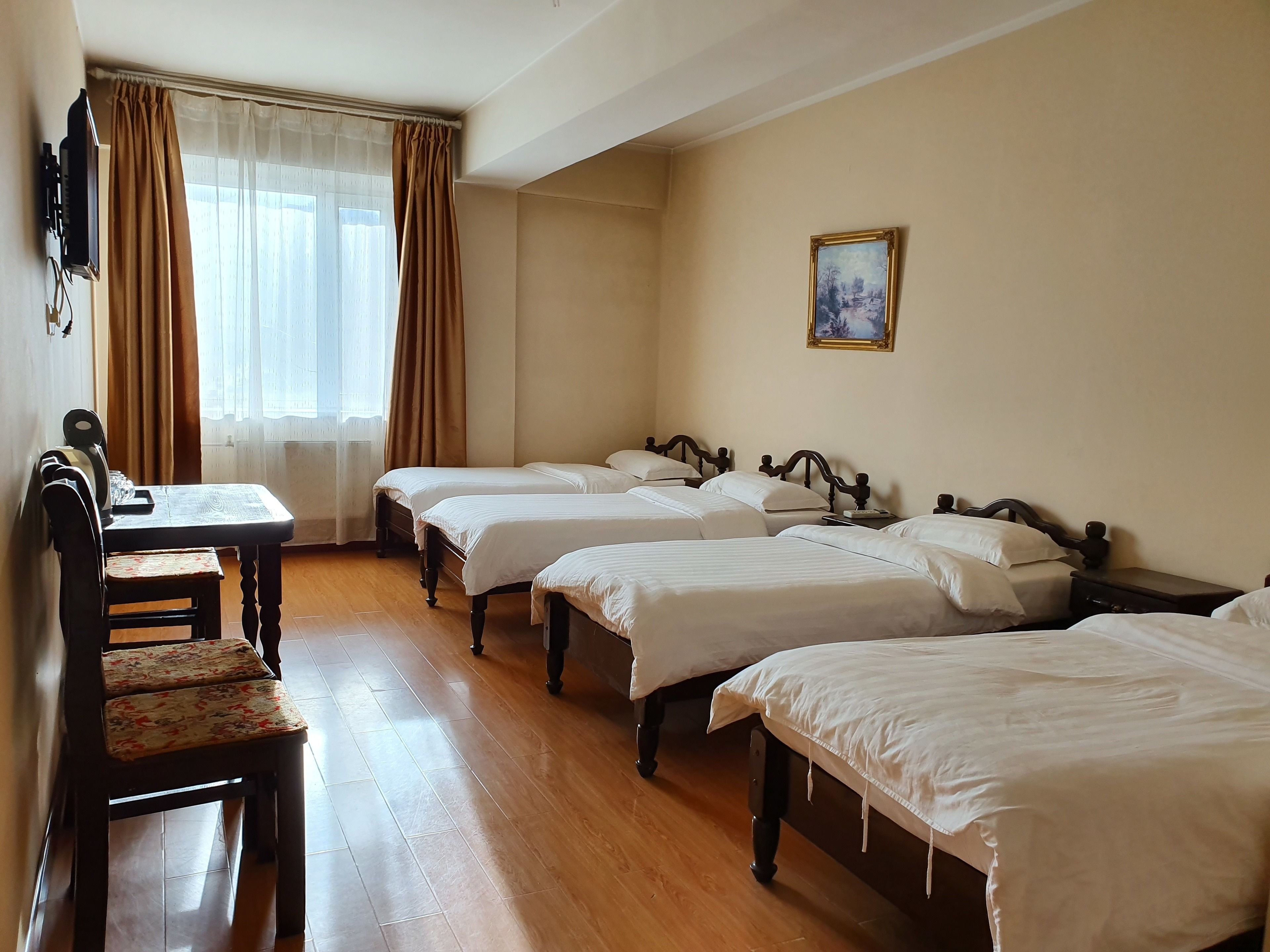 standard quadruple room, 1 bedroom | living room | lcd tv