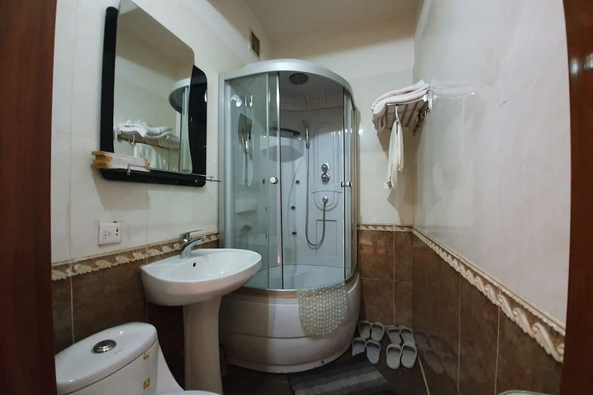 standard quadruple room, 1 bedroom | bathroom | combined shower/bathtub, rainfall showerhead, free toiletries, slippers
