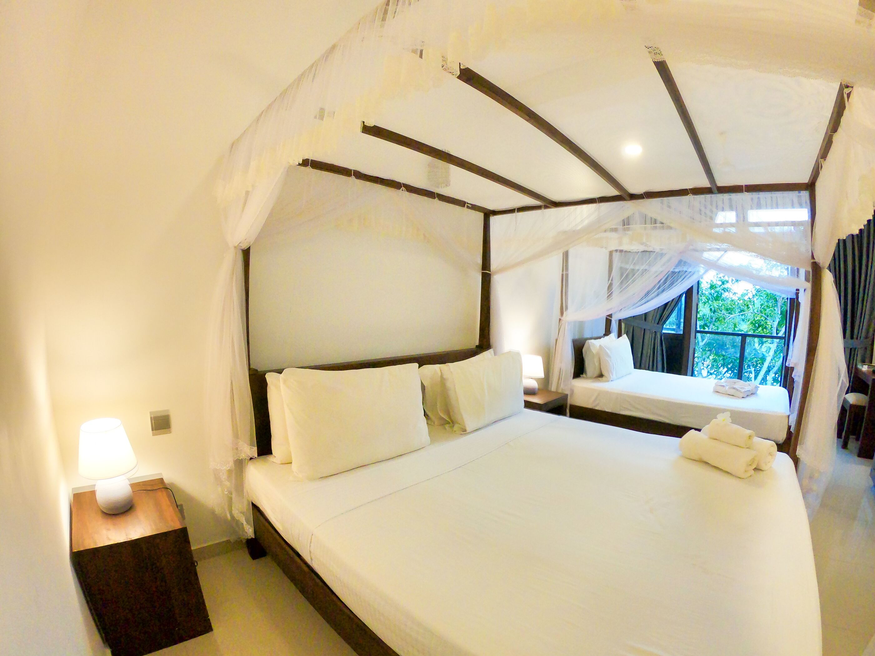 Deluxe Triple Room | 1 bedroom, minibar, in-room safe, desk
