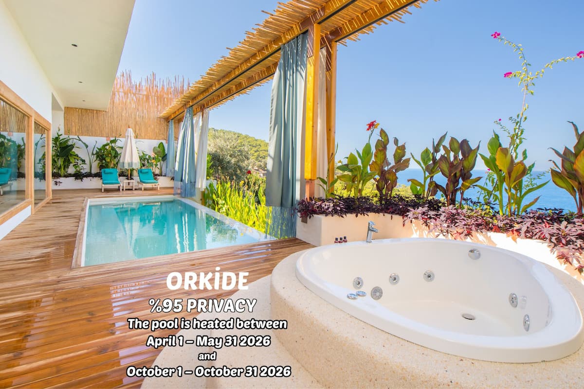 Orkide King Room Full Sea View (95% Privacy - Heated Pool: April 1-May 31 / October 1-31, 2026) | Tempur-Pedic-madrasser, minibar, individuell inredning och unika möbler