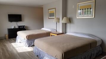 Double Room, 2 Queen Beds | 1 bedroom, individually decorated, individually furnished, desk