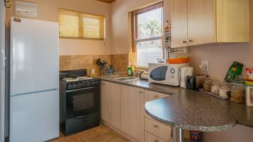 Large Balcony Studio Apartment | Private kitchenette