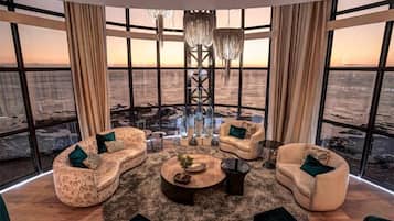 Ocean View Penthouse | Living room | Flat-screen TV