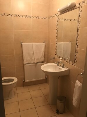 Shower, free toiletries, hair dryer, towels