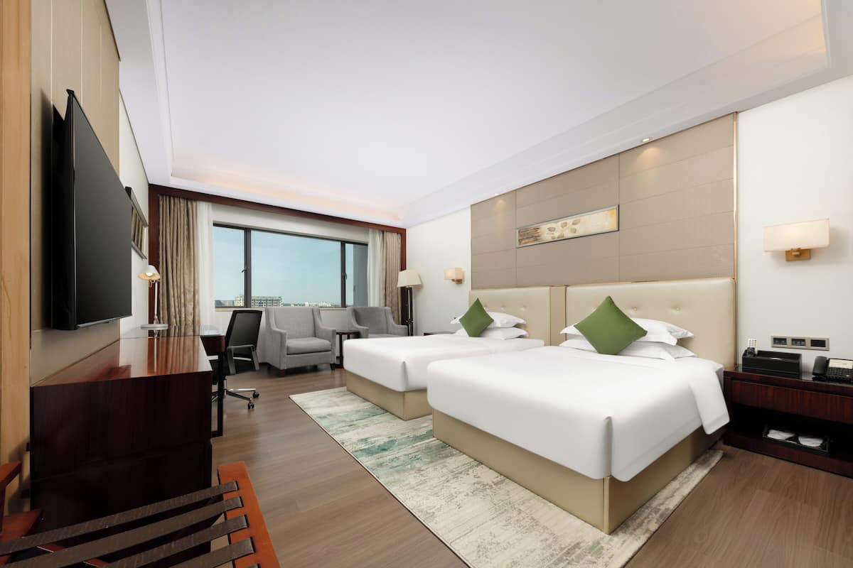 Luxe beddengoed, een minibar, een kluis op de kamer, een bureau