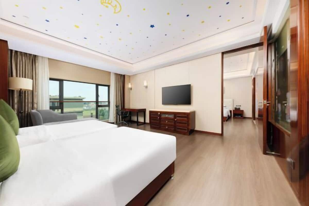 Luxe beddengoed, een minibar, een kluis op de kamer, een bureau