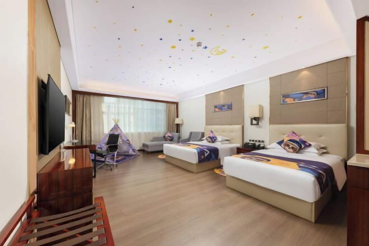 Luxe beddengoed, een minibar, een kluis op de kamer, een bureau
