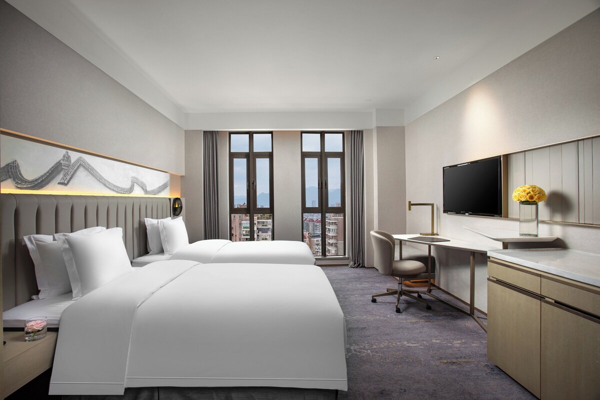 Ropa de cama de alta calidad y minibar 